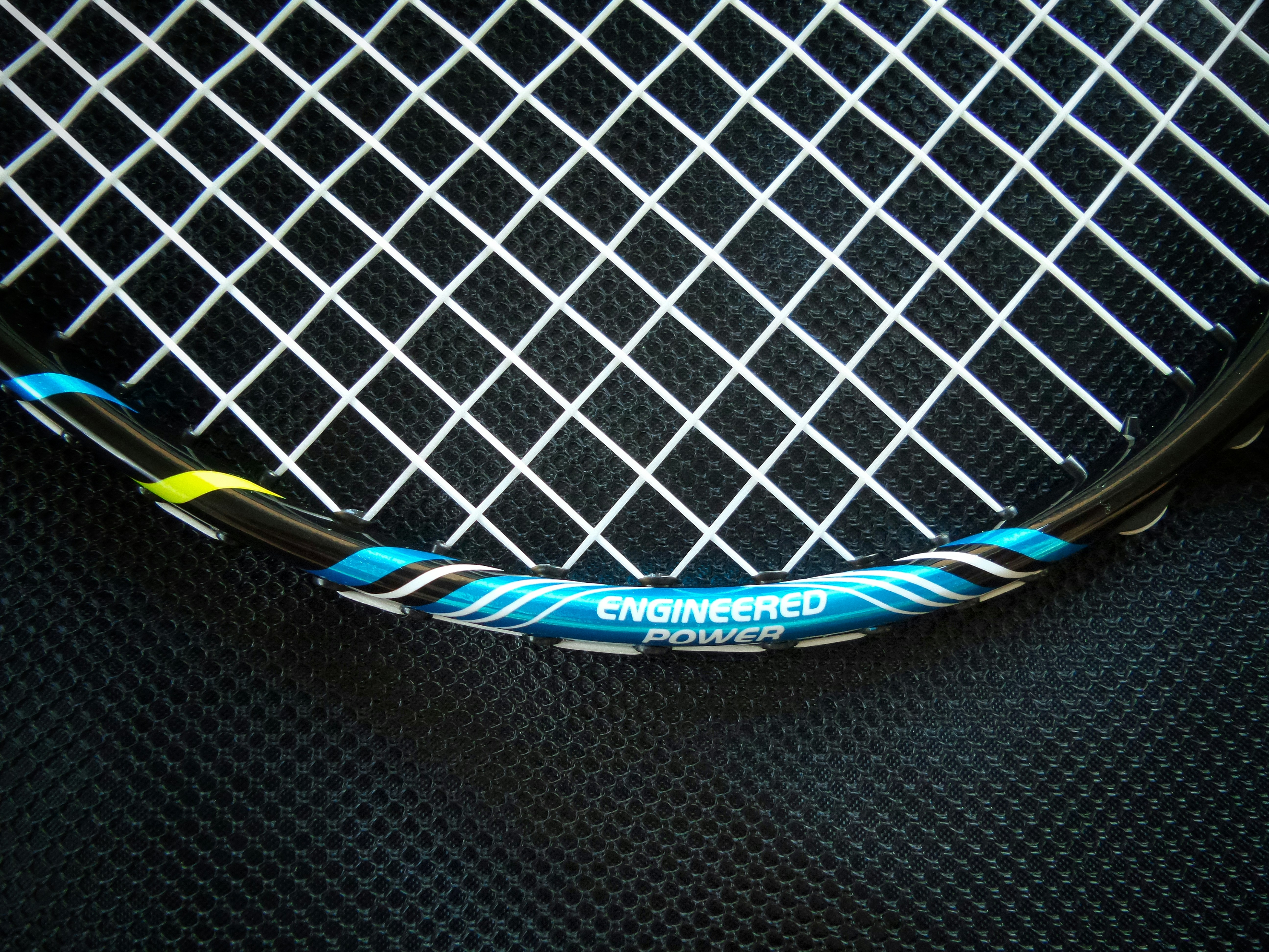 Close-up of tennis racquet strings